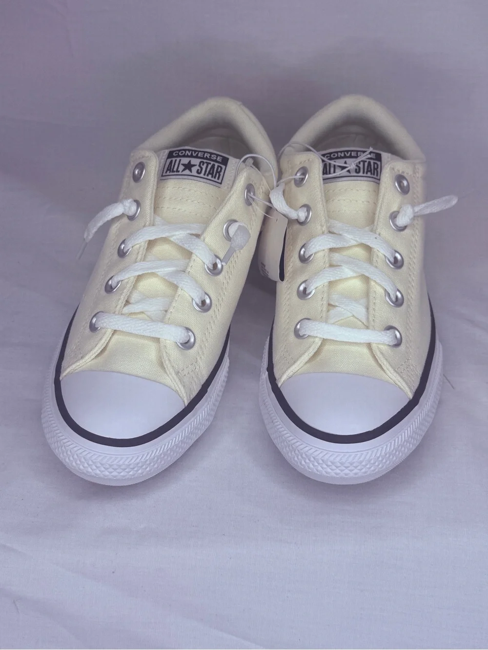 Converse Kids Low Top Sneakers in Pale Yellow and White